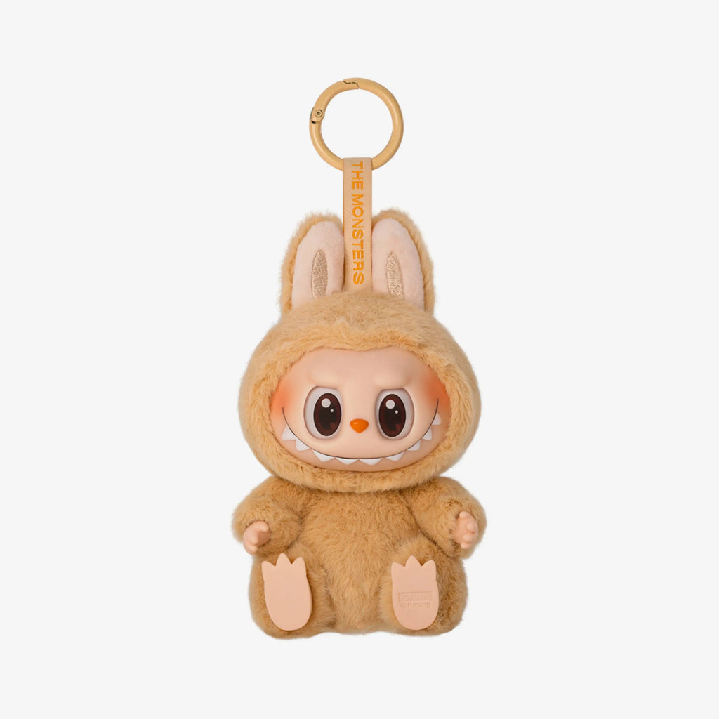 Boneco Labubu caramelo Popmart com expressão sorridente e fantasia felpuda da coleção Have A Seat